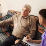 Male client and male carer at Universal Care Services