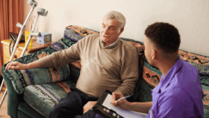 Male client and male carer at Universal Care Services